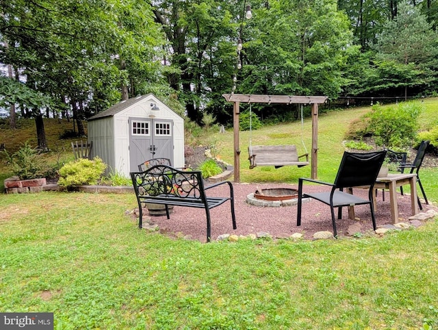 48 W 3rd St, Everett, PA 15537 - view of green lawn with an outdoor fire pit and a storage unit