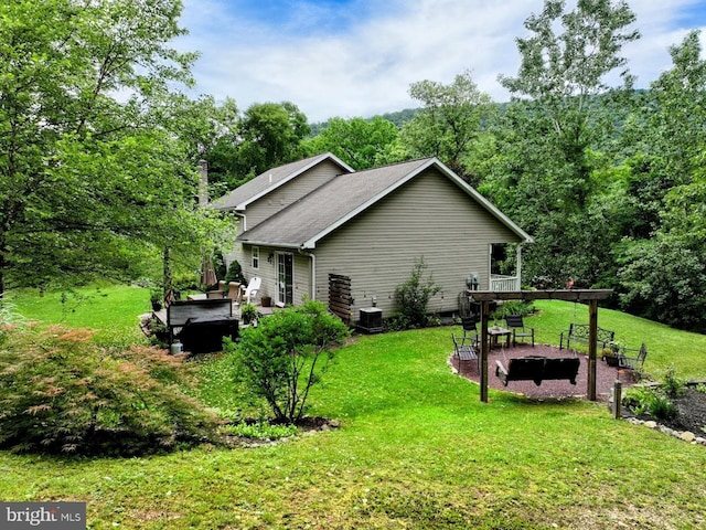 48 W 3rd St, Everett, PA 15537 - rear view of property with a lawn, a patio, a wooden deck, and a chimney