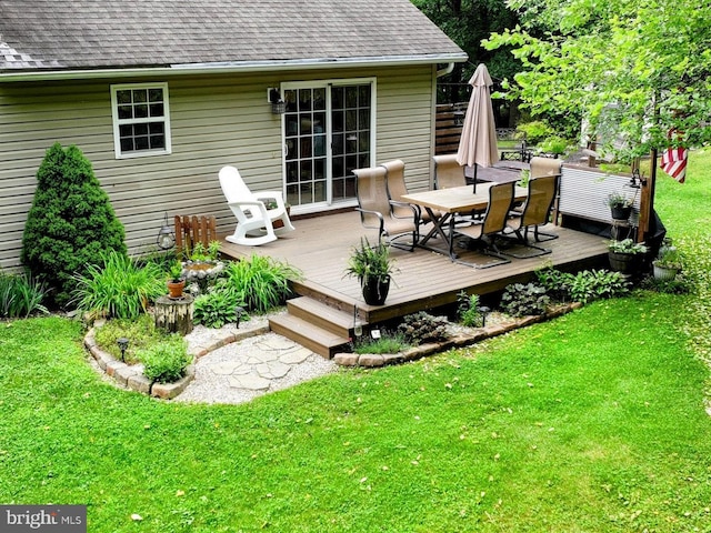 48 W 3rd St, Everett, PA 15537 - wooden deck with outdoor dining area and a lawn