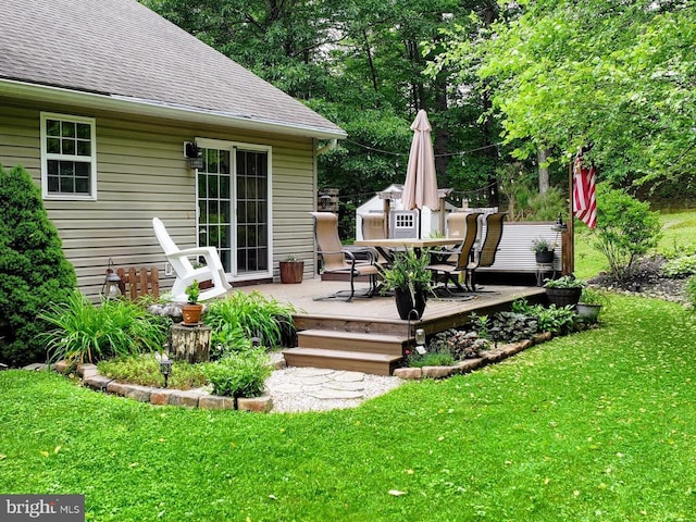 48 W 3rd St, Everett, PA 15537 - wooden deck with a lawn and outdoor dining area