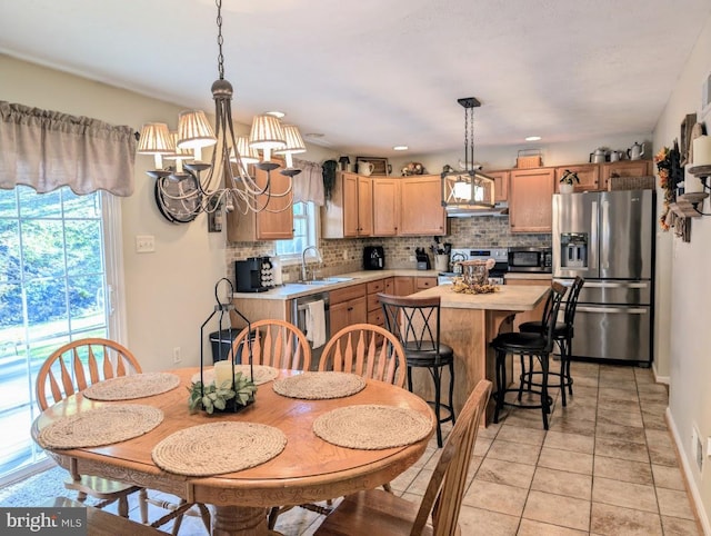 48 W 3rd St, Everett, PA 15537 - dining space with a chandelier and light tile patterned floors