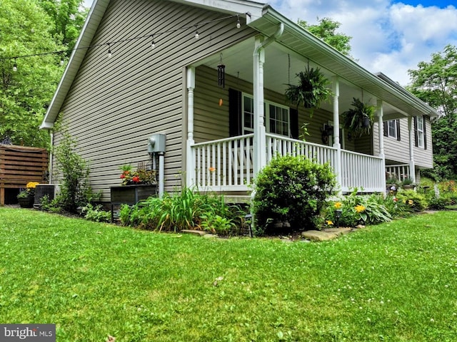 48 W 3rd St, Everett, PA 15537 - view of side of home featuring a porch and a lawn