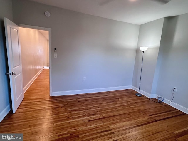 spare room featuring hardwood / wood-style flooring