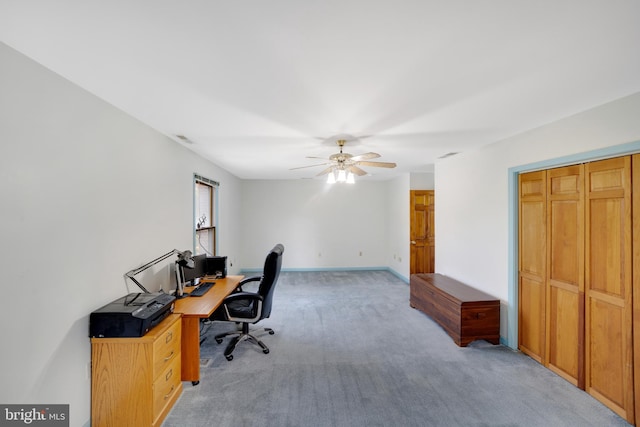 office featuring light colored carpet and ceiling fan