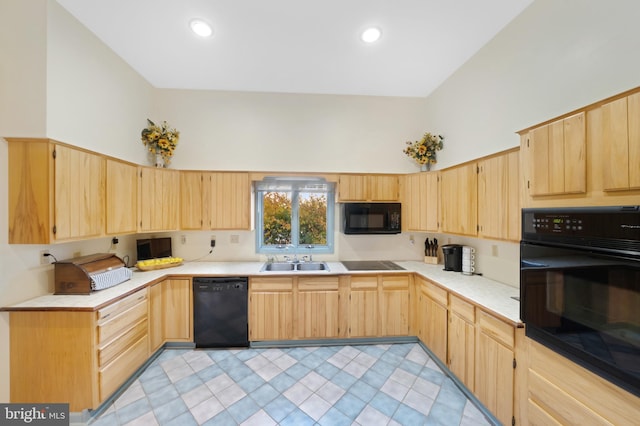 kitchen featuring sink, black appliances, and light brown cabinets