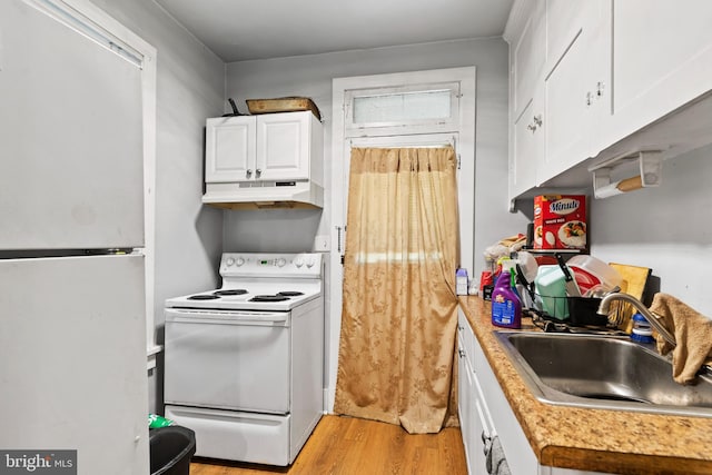 kitchen featuring light hardwood / wood-style floors, white cabinets, sink, and white appliances