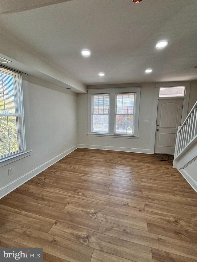 interior space with hardwood / wood-style floors