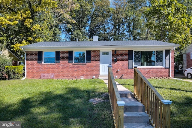 view of front of property with a front lawn