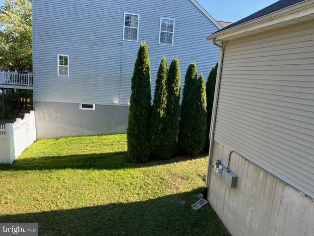 view of home's exterior featuring a lawn