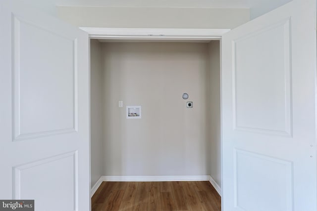 clothes washing area with hookup for a washing machine, wood-type flooring, and electric dryer hookup