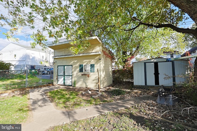 exterior space featuring a storage unit