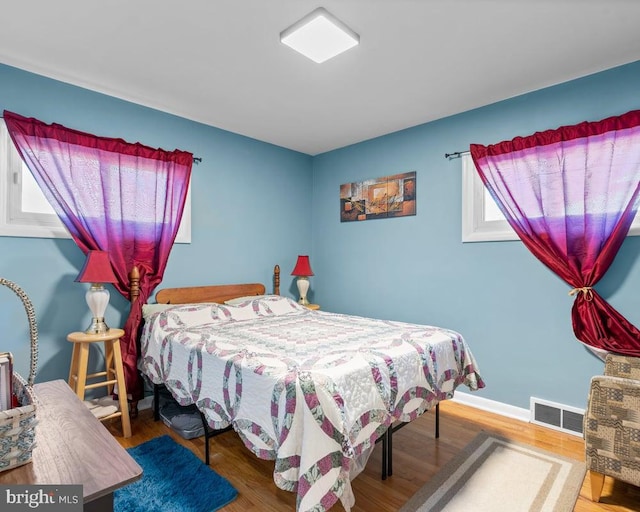 bedroom featuring hardwood / wood-style flooring