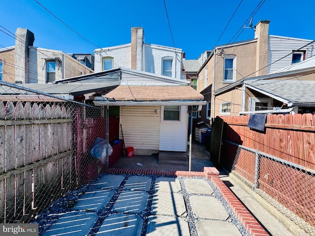 rear view of house featuring a patio area