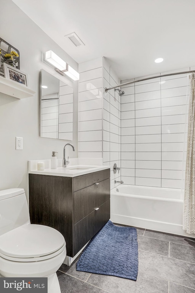 full bathroom with tile patterned flooring, vanity, toilet, and shower / tub combo