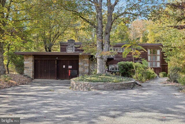 view of front of home with a garage