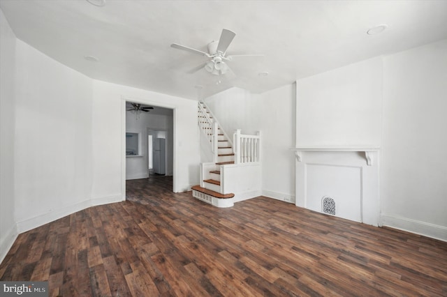 128 N Dewey St, Philadelphia, PA 19139 - unfurnished living room featuring ceiling fan, baseboards, wood finished floors, and stairs