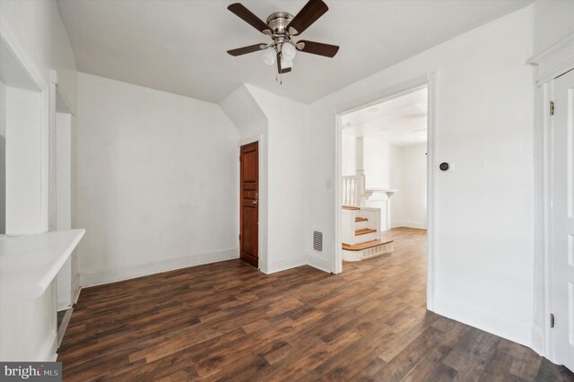 128 N Dewey St, Philadelphia, PA 19139 - unfurnished living room featuring ceiling fan, baseboards, dark wood finished floors, and stairway