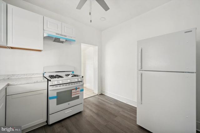 kitchen featuring ceiling fan, white cabinets, dark hardwood / wood-style flooring, white fridge, and range with gas cooktop