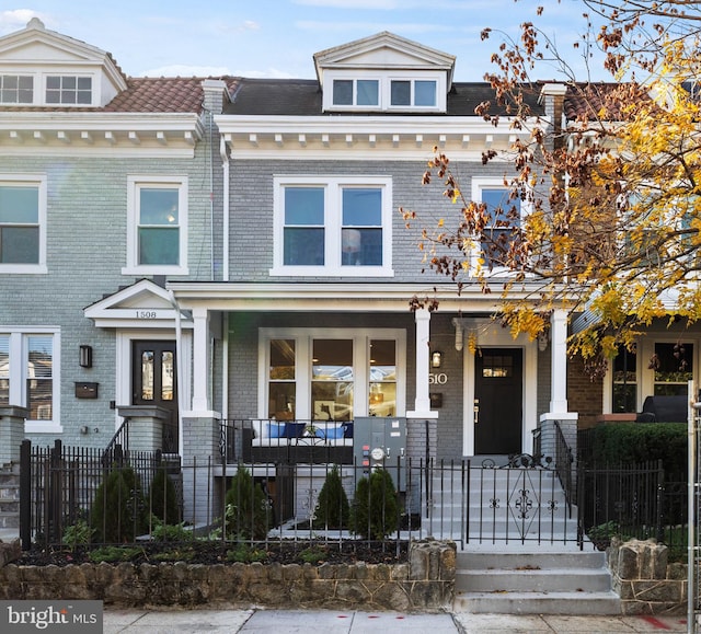 view of front of home featuring covered porch