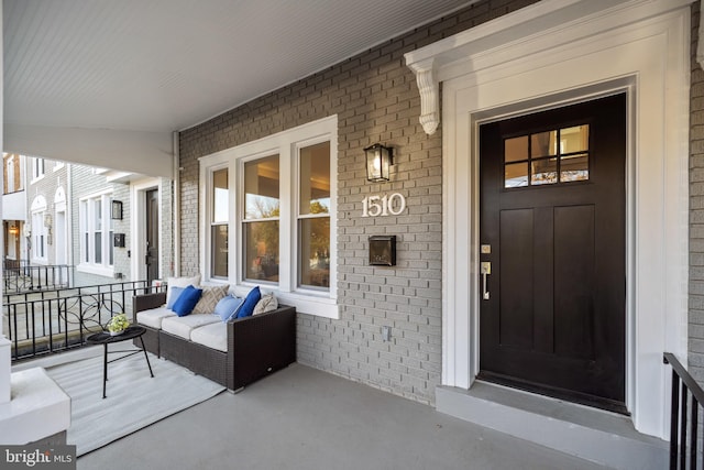 property entrance with covered porch