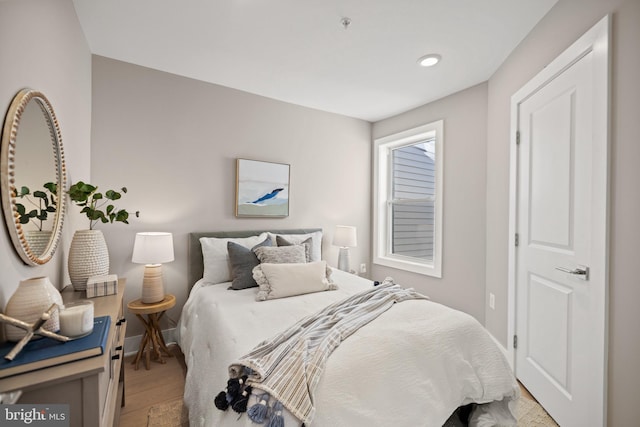 bedroom featuring light hardwood / wood-style flooring