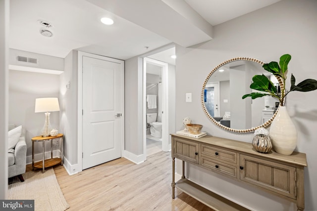 hall featuring light hardwood / wood-style flooring