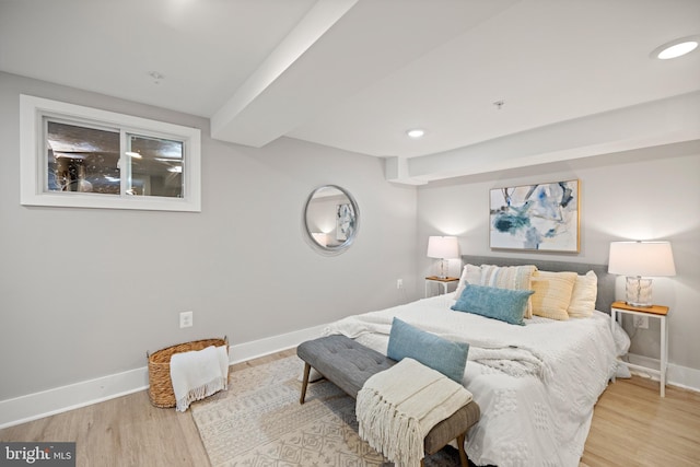 bedroom with light hardwood / wood-style flooring