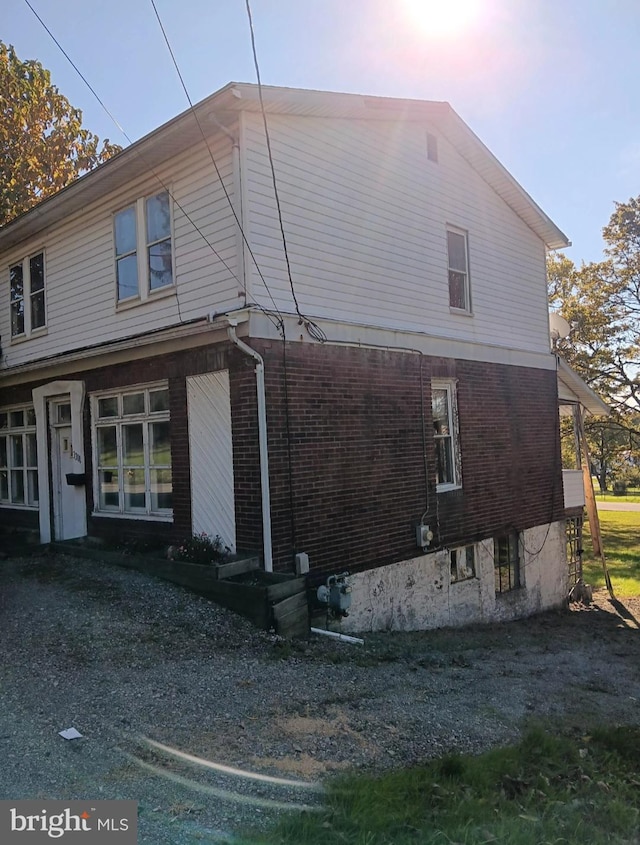 view of property exterior at dusk