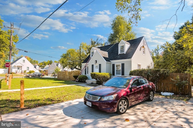 view of home's exterior with a yard