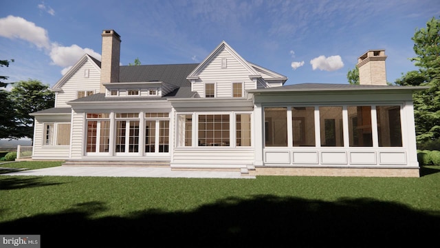 rear view of property with a lawn and a sunroom