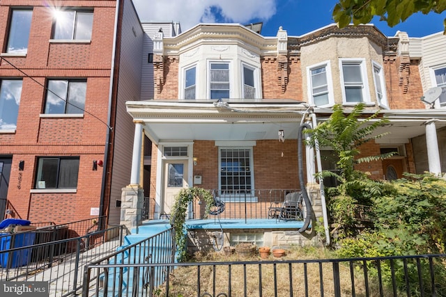 view of property with a porch