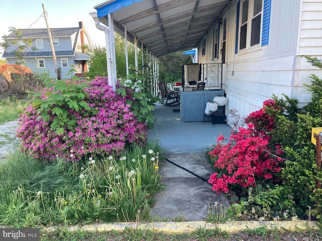 view of patio featuring a carport