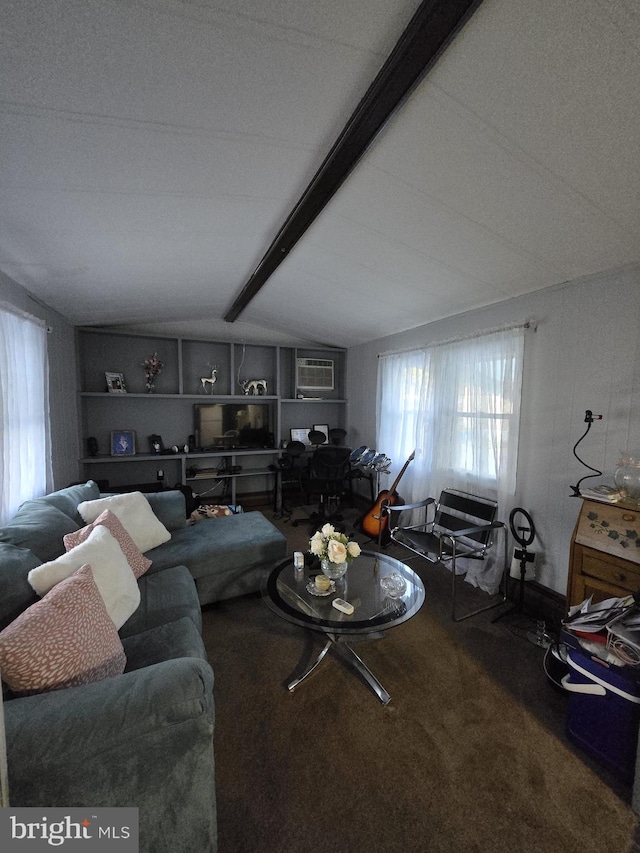 carpeted living room with a wall unit AC and vaulted ceiling with beams