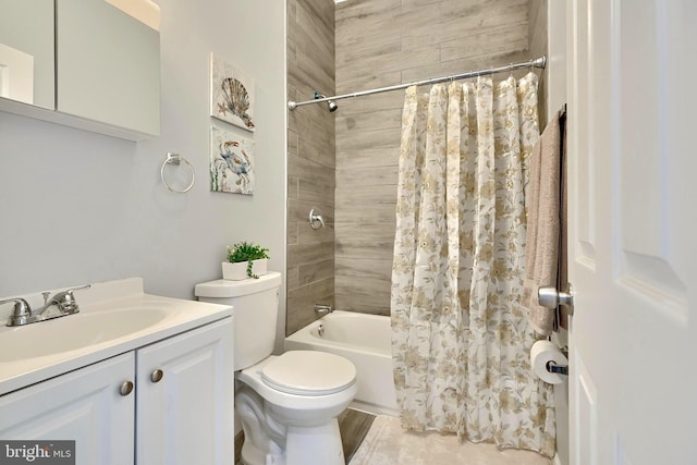 full bathroom featuring vanity, toilet, and shower / tub combo