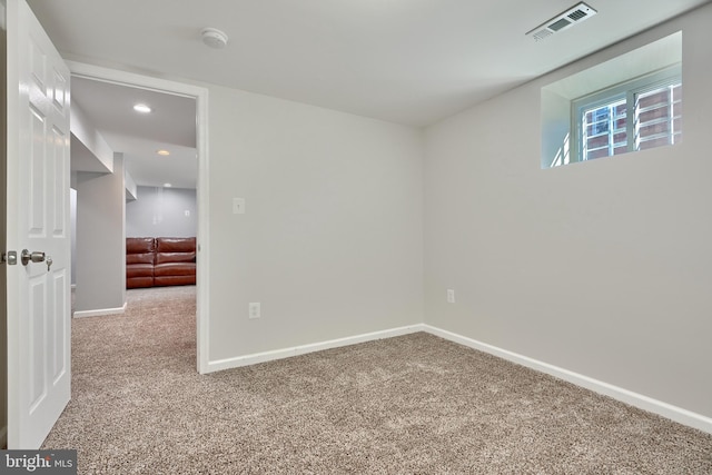 spare room with carpet flooring