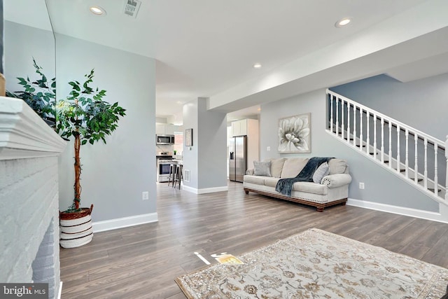 living room featuring hardwood / wood-style flooring