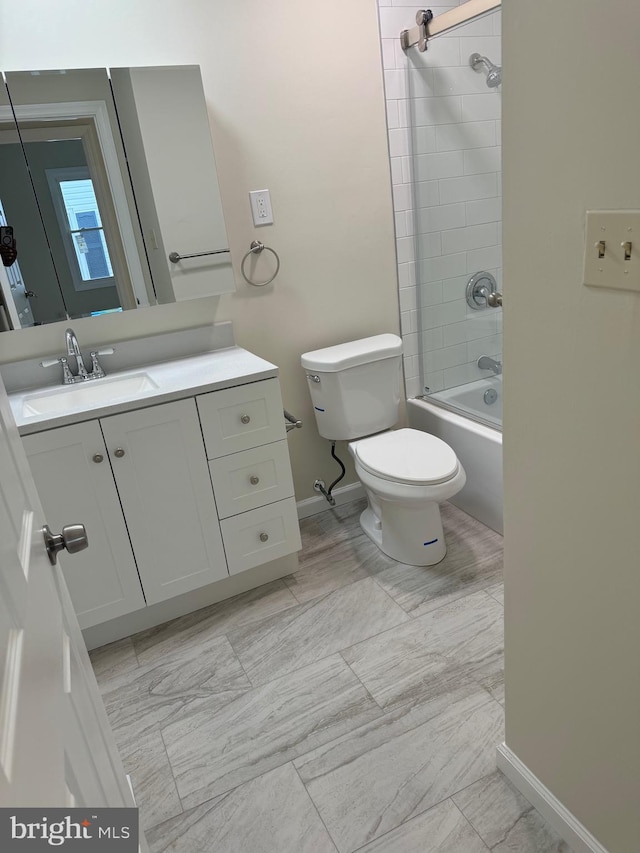 full bath with toilet, tub / shower combination, baseboards, and vanity