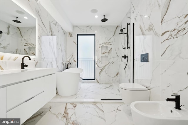 full bathroom featuring vanity, toilet, a bidet, and shower with separate bathtub