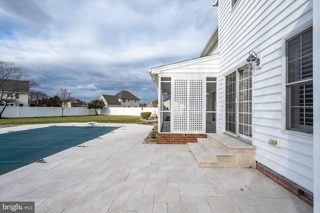 view of patio / terrace with a fenced backyard and a fenced in pool