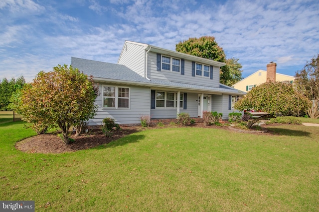 view of front facade featuring a front yard