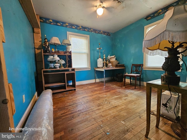 misc room featuring ceiling fan and hardwood / wood-style flooring