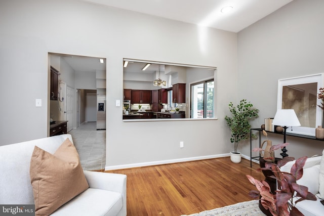 sitting room featuring light hardwood / wood-style floors