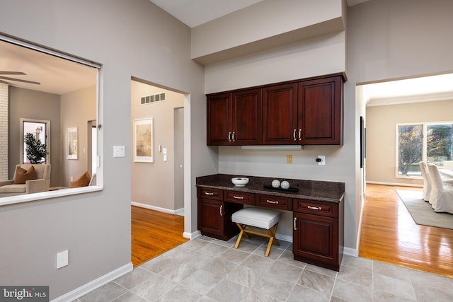 office space featuring light hardwood / wood-style floors and ceiling fan