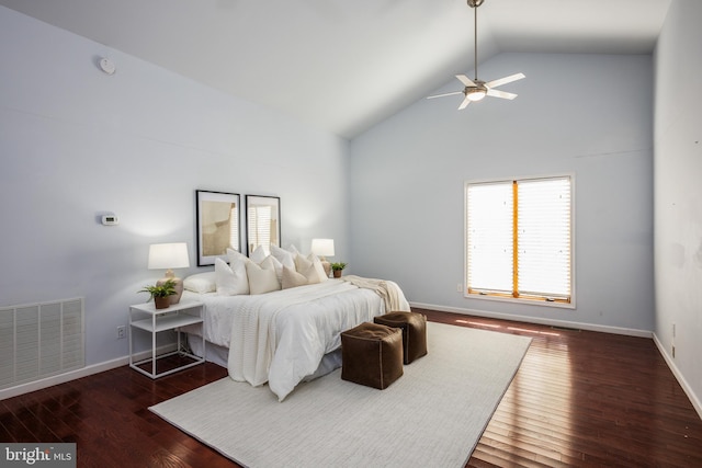 bedroom with dark hardwood / wood-style floors, high vaulted ceiling, and ceiling fan