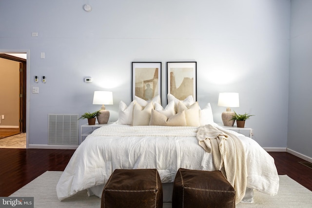 bedroom featuring wood-type flooring