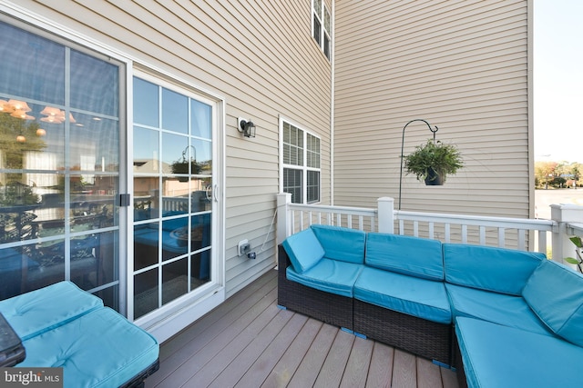 deck with an outdoor hangout area