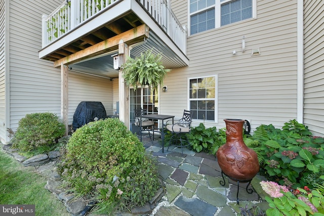 view of patio / terrace with a balcony