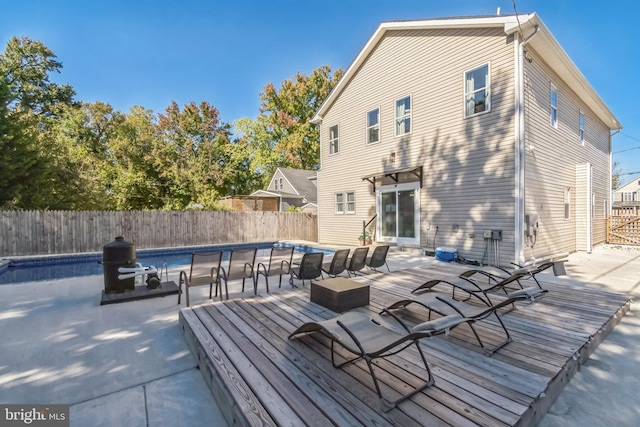 exterior space featuring a swimming pool side deck