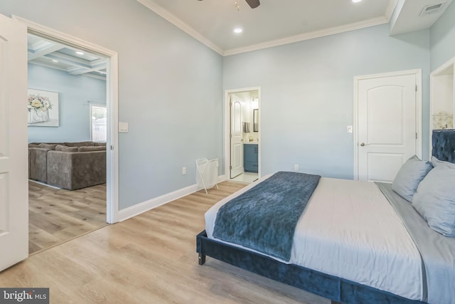 bedroom featuring ceiling fan, light wood-type flooring, ensuite bathroom, and ornamental molding