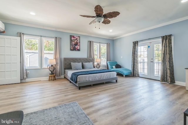 bedroom with access to exterior, french doors, light wood-type flooring, ceiling fan, and crown molding